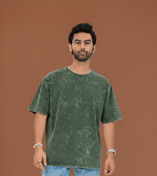 Plain acid wash oversized t-shirt in green, showing the mottled garment-wash fade