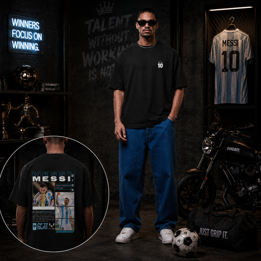Man wearing the Number 10 Messi oversized football fan t-shirt in black, front and back artwork
