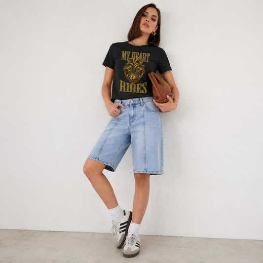 Woman wearing the My Heart Rides women's motorcycle t-shirt in black, print reading MY HEART RIDES