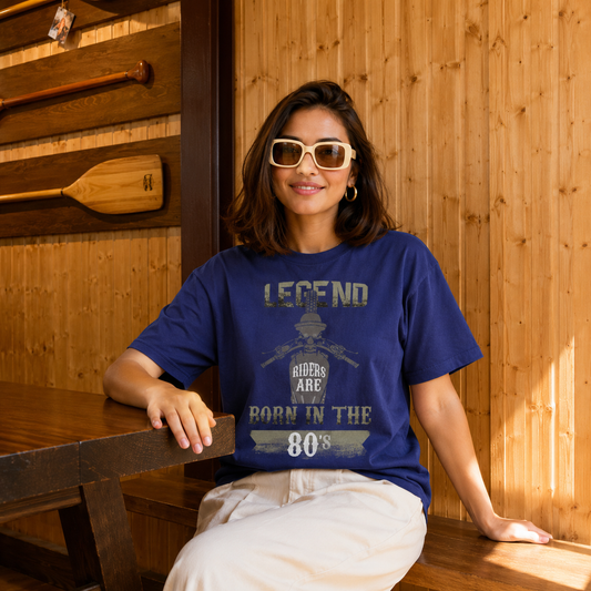 Woman wearing the Legend Riders Are Born in the 80s women's biker t-shirt in blue, birth-year print