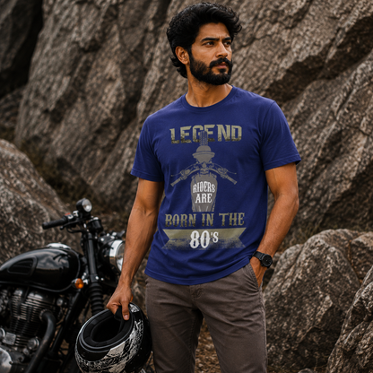 Rider wearing the Legend Riders Are Born in the 80s biker t-shirt in blue, front view of the typography print