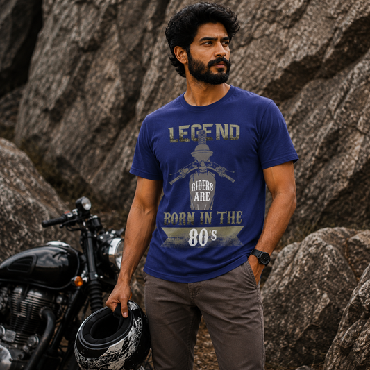 Rider wearing the Legend Riders Are Born in the 80s biker t-shirt in blue, front view of the typography print