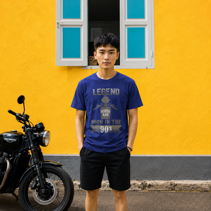 Rider wearing the Legend Riders Are Born in the 90s biker t-shirt in blue, front view of the print