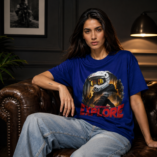 Woman wearing the Born to Explore women's adventure rider t-shirt in blue, front view of the print