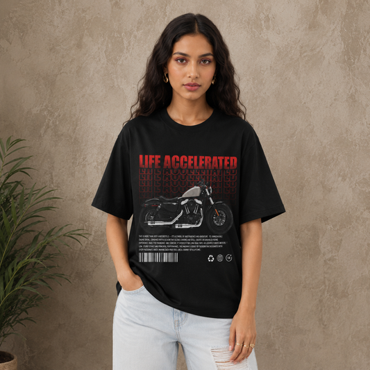 Woman wearing the Life Accelerated cruiser-style women's biker t-shirt in black, front print visible