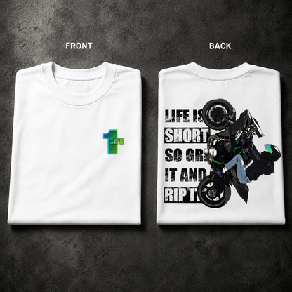 Grip It and Rip It oversized biker t-shirt in white, folded to show the GRIP IT AND RIP IT print