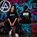 Woman wearing the I Love Linkin Park women's oversized music fan t-shirt in black, front and back print