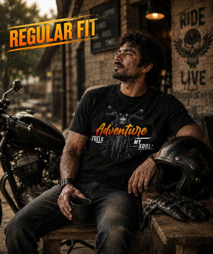 Rider wearing black Adventure Fuels My Soul Premium Biker T-Shirt during a motorcycle break.