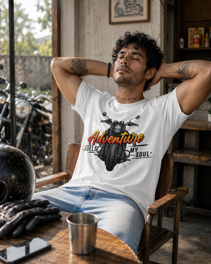 Rider relaxing while wearing white Adventure Fuels My Soul Premium Biker T-Shirt.