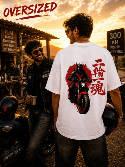 Rider wearing white Two Wheels One Soul Premium Oversized Biker T-Shirt featuring large motorcycle artwork on the back.